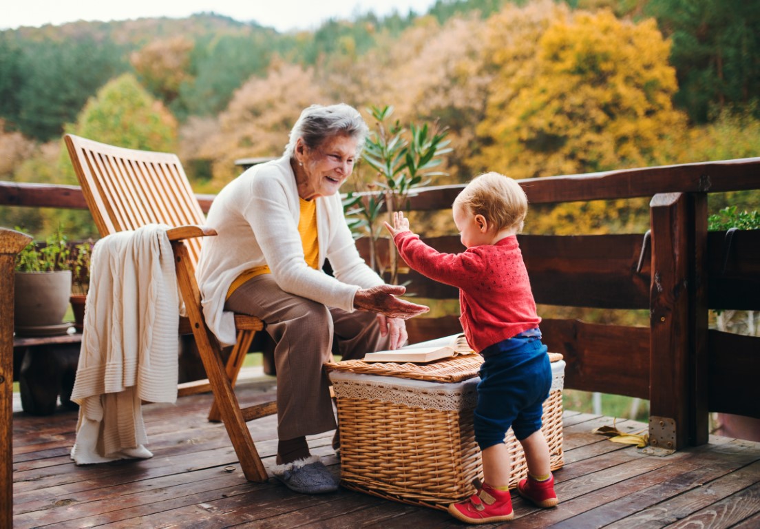 Grandmother enjoying time with her great-grandchild
